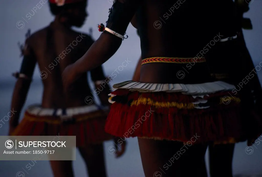 Papua New Guinea, Trobriand Islands, Cropped Shot Of Girls Dressed For Traditional Dance