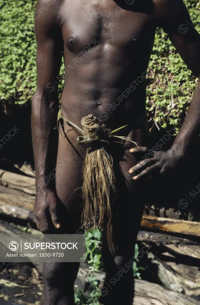 Pacific Islands, Melanesia, Vanuatu, Tanna.  The Nambas.  Cropped Shot Of Tribesman Wearing Penis Sheath.