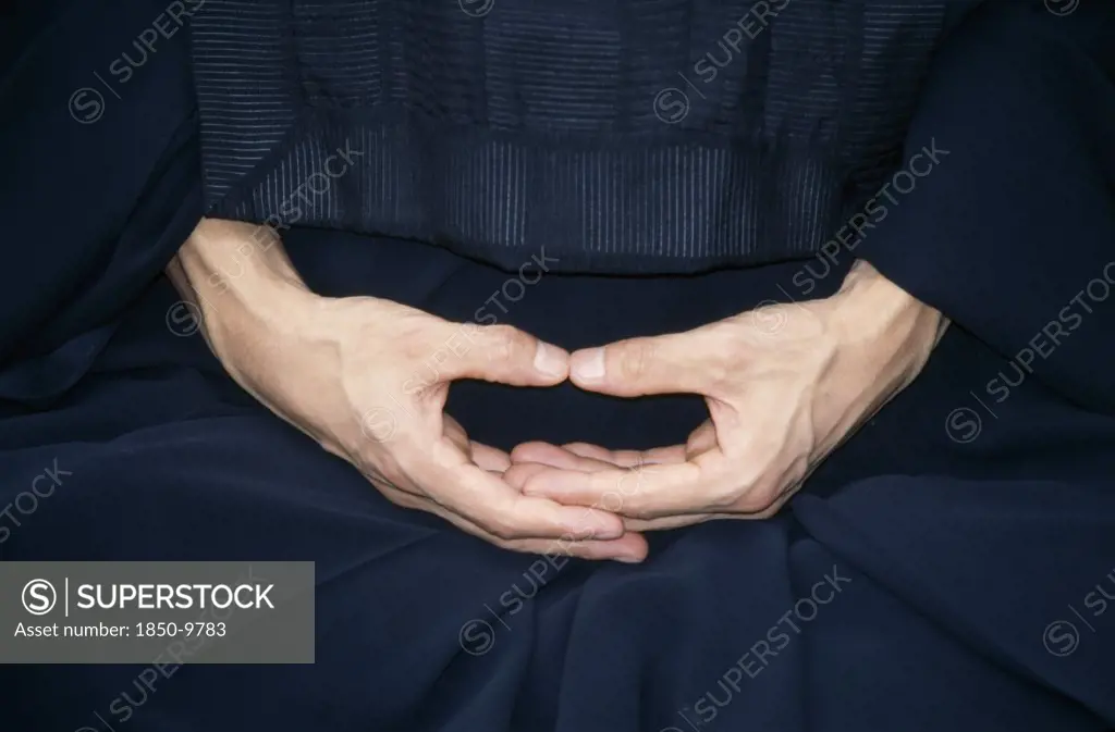 Japan, Zen, Cropped View Of Monk In Zen Buddhist Monastery Showing Hands In Mudra The Position Of Meditation