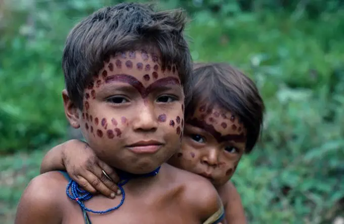 Colombia, North West Amazon, Tukano Indigenous People, Portrait Of Two Young Makuna Children With Dark Red Mixture Of Achiote And We Dye Ceremonial Face Paint. Tukano  Makuna Indian North Western Amazonia American Colombian Columbia Hispanic Indegent Kids Latin America Latino South America Tukano