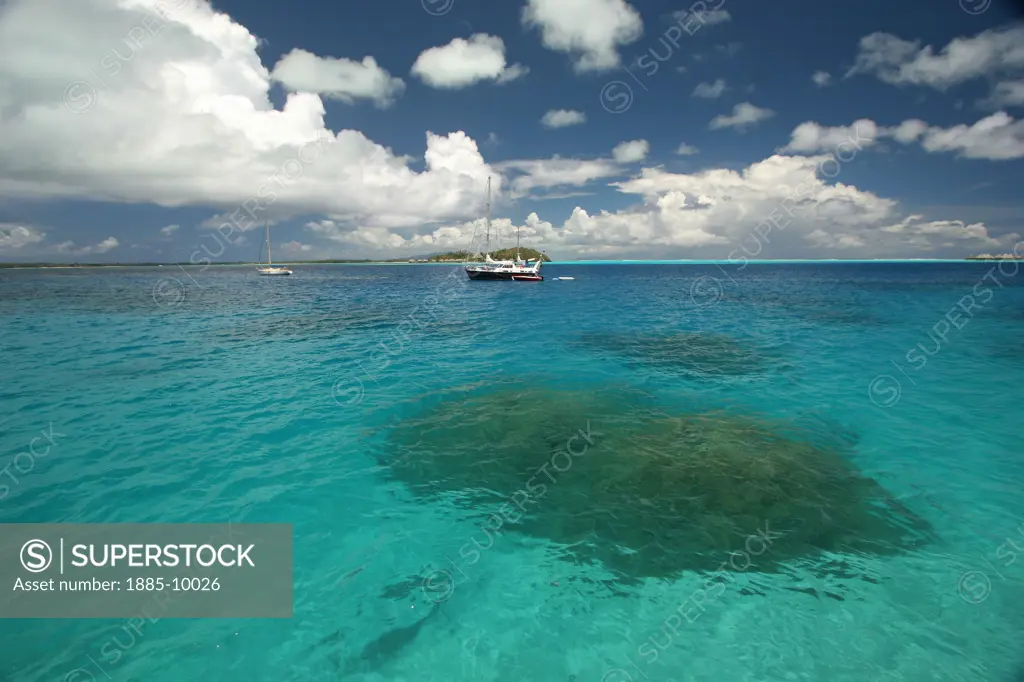 Society Islands, Bora Bora, Bora Bora, Boats on turquoise lagoon 