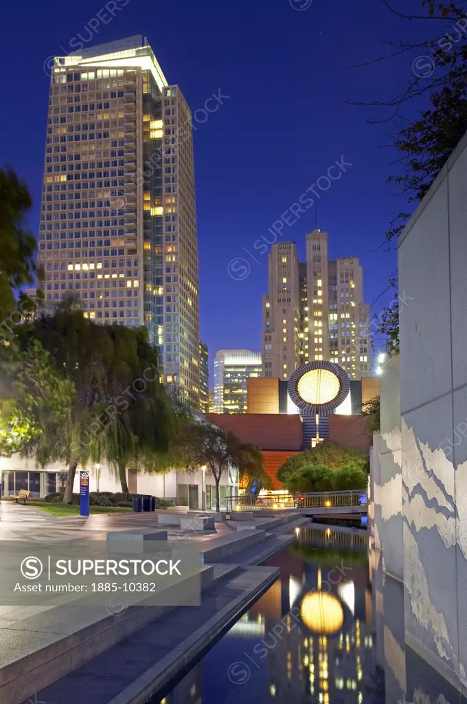 USA, California, San Francisco, Esplanade Gardens and Museum of Modern Art at Yerba Buena Gardens at dusk