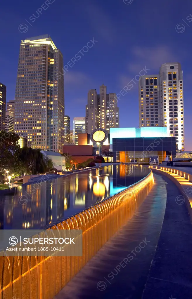 USA, California, San Francisco, Esplanade Gardens and Museum of Modern Art at Yerba Buena Gardens at dusk