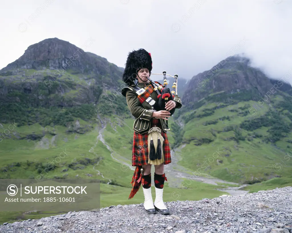 UK - Scotland, Highland, General, Highland Piper and highland scenery