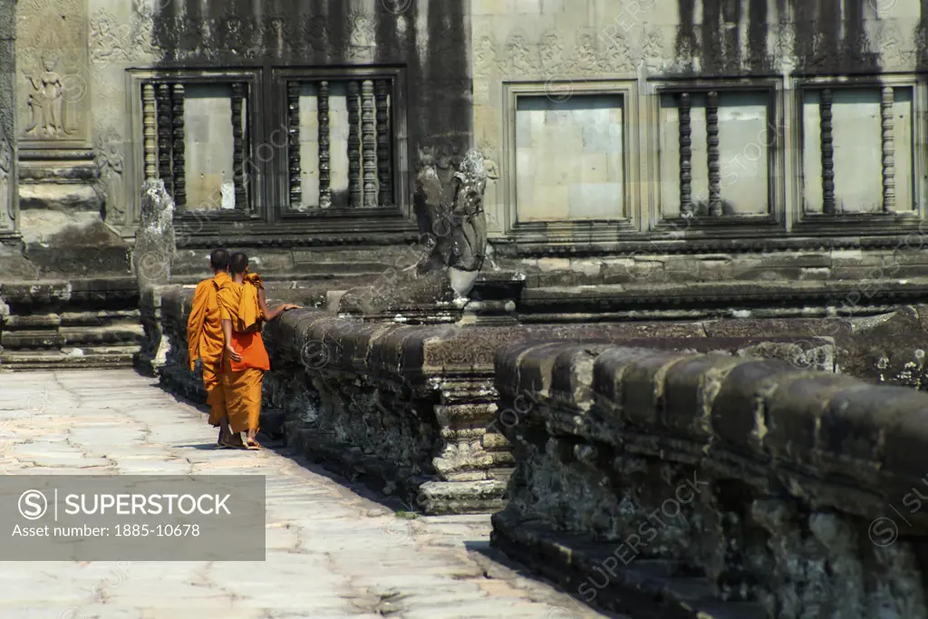 Cambodia, , Siem Reap - near, Monks in orange robes at Angkor Wat