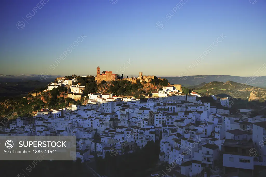 Spain, Andalucia, Casares, View over white hill town at dawn