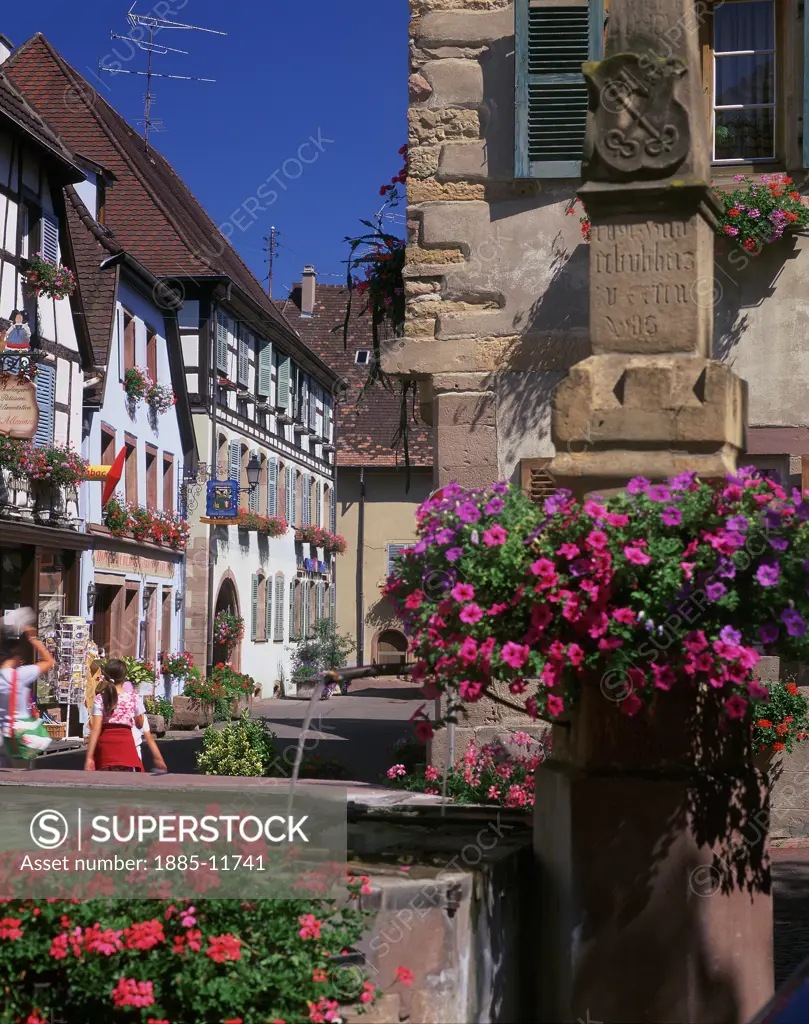 France, Alsace, Eguisheim, Street scene in summer