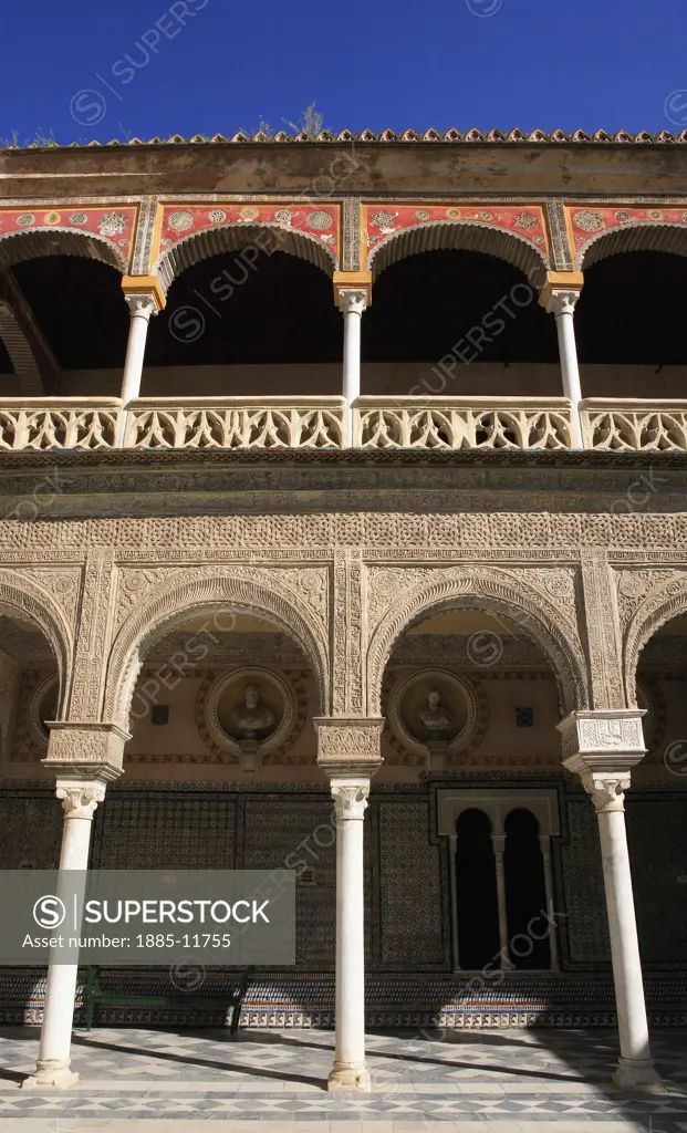Spain, Andalucia, Seville, Casa de Pilatos - courtyard arches