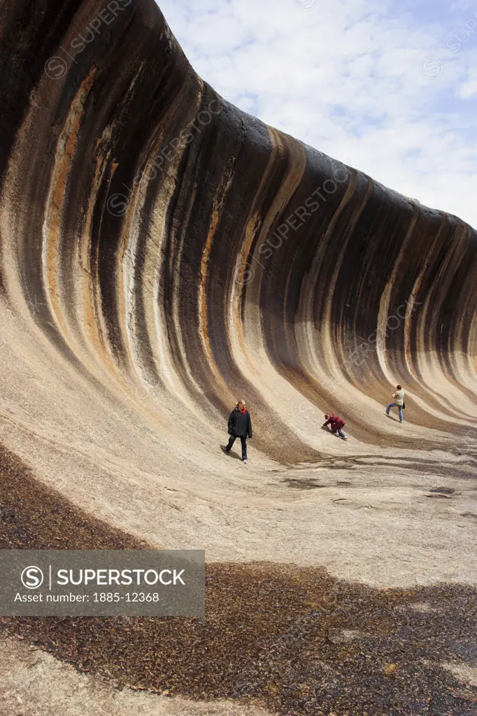 Australia, Western Australia, Hyden, Tourists exploring Wave Rock 
