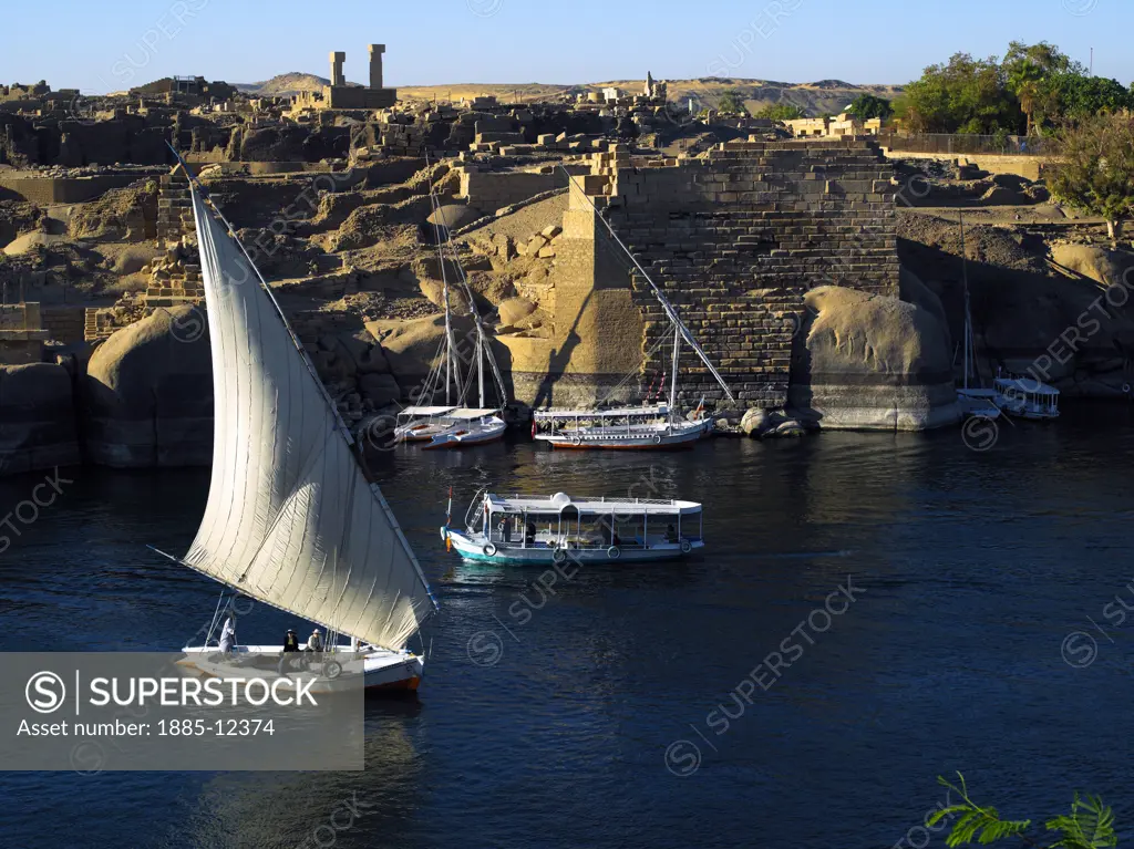 Egypt, , Aswan, River Nile with feluccas and view towards Abu Simbel