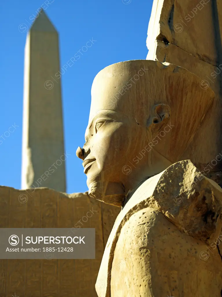 Egypt, , Luxor, Karnak - close up of statue and obelisk at Temple of Amun