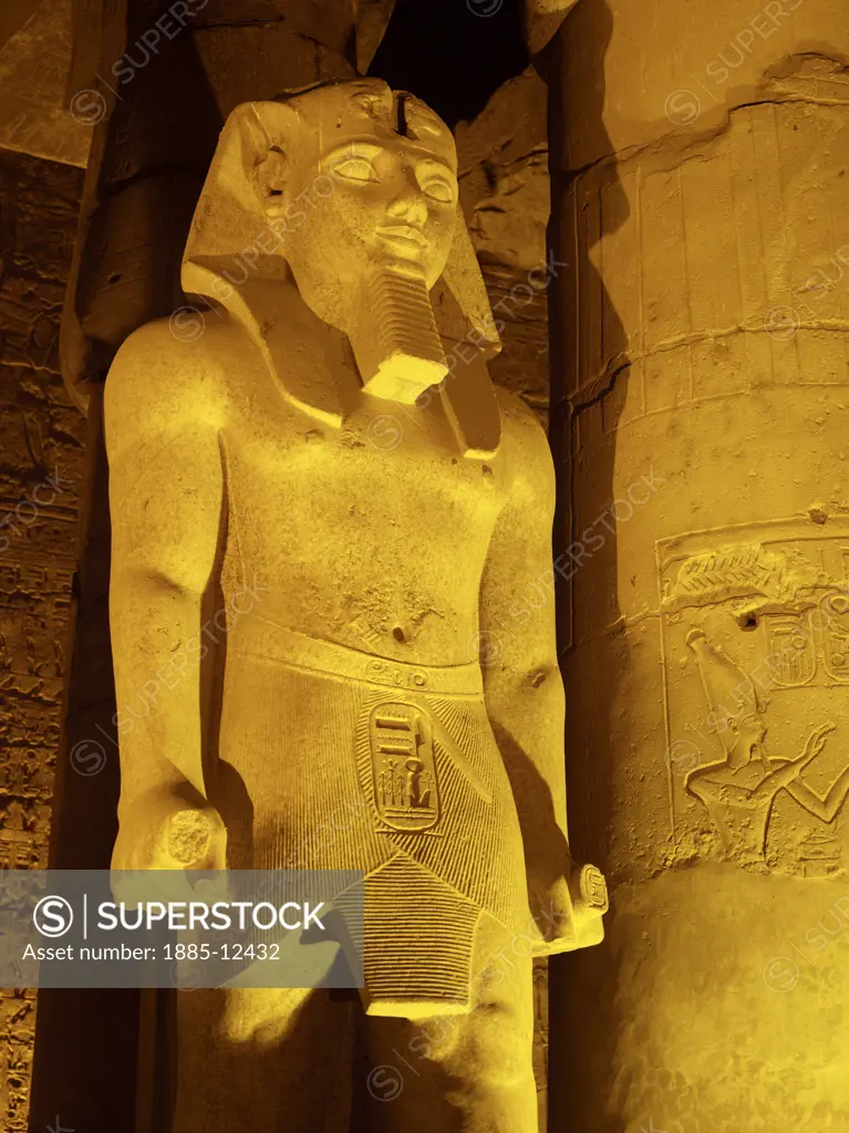 Egypt, , Luxor, Karnak - floodlit statue of Ramses II in the Great Court at Temple of Amun