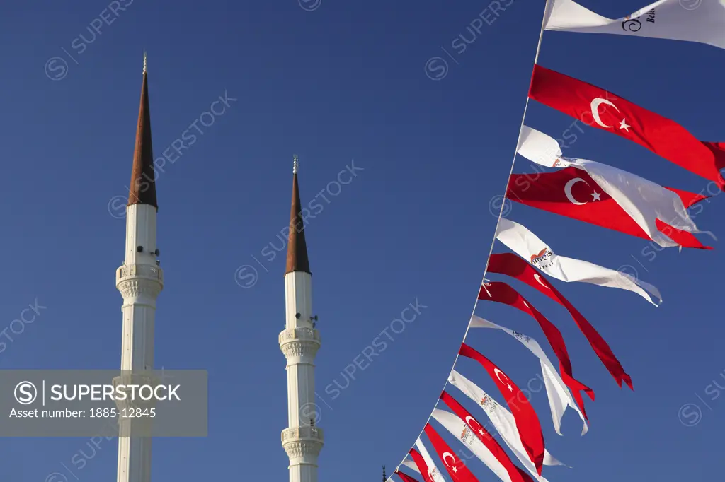 Turkey, Aegean, Turgutreis, Minarets of mosque and flags