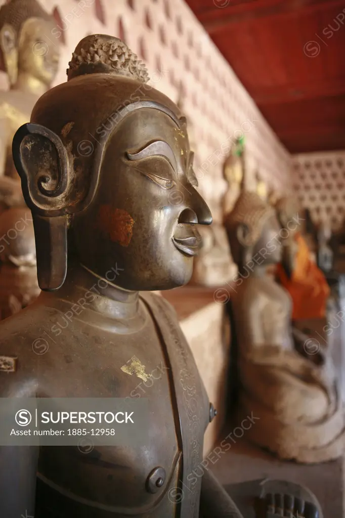 Laos, , Vientiane, Close up of bronze Buddha statue at Wat Si Saket