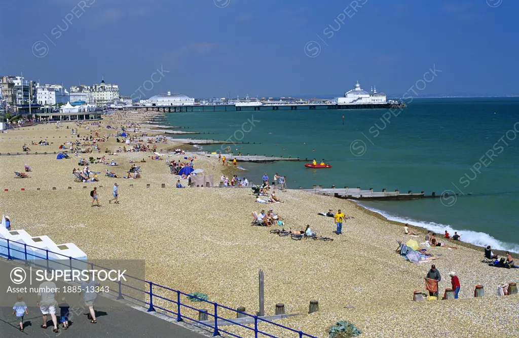 UK - England, East Sussex, Eastbourne, View along beach to pier