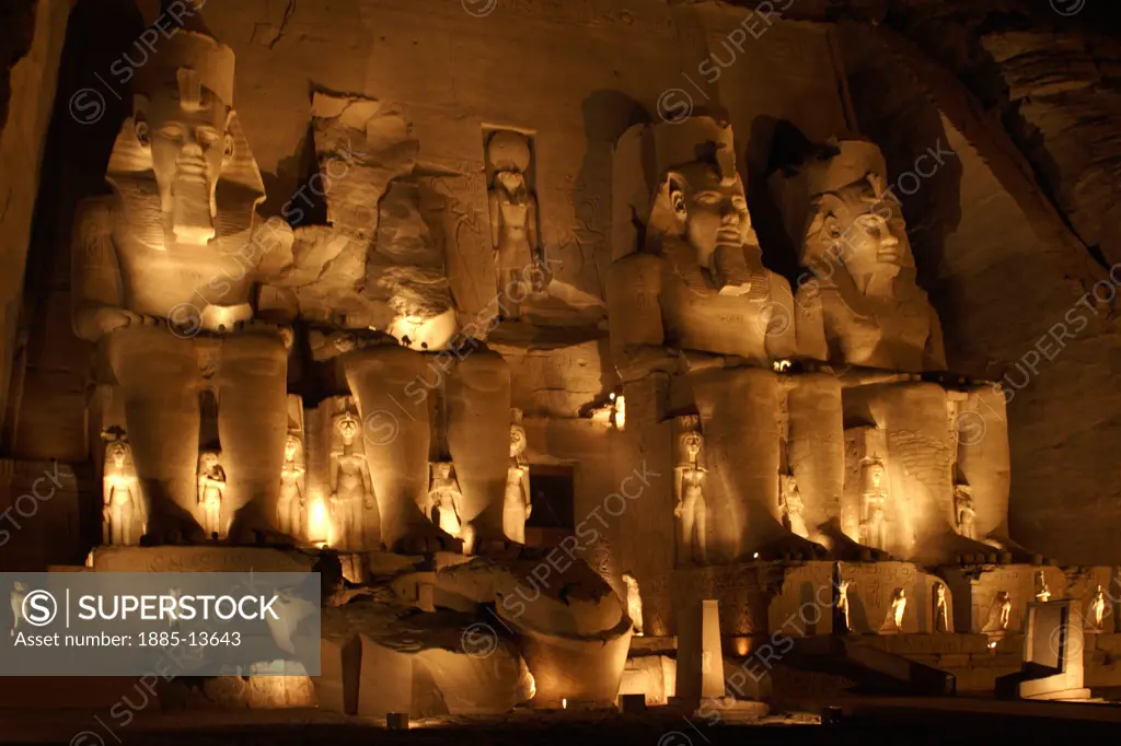 Egypt, , Abu Simbel, Floodlit statues in Temple of Ramses II at night