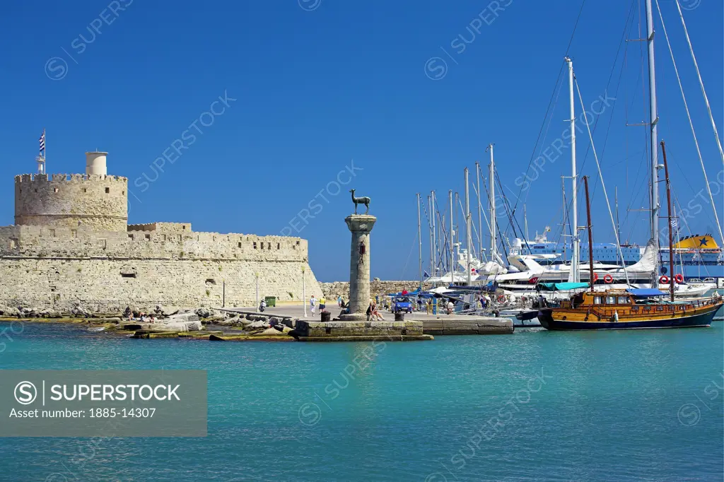 Greek Islands, Rhodes Island, Rhodes Town, Mandraki Harbour with St Nicholas Fort 