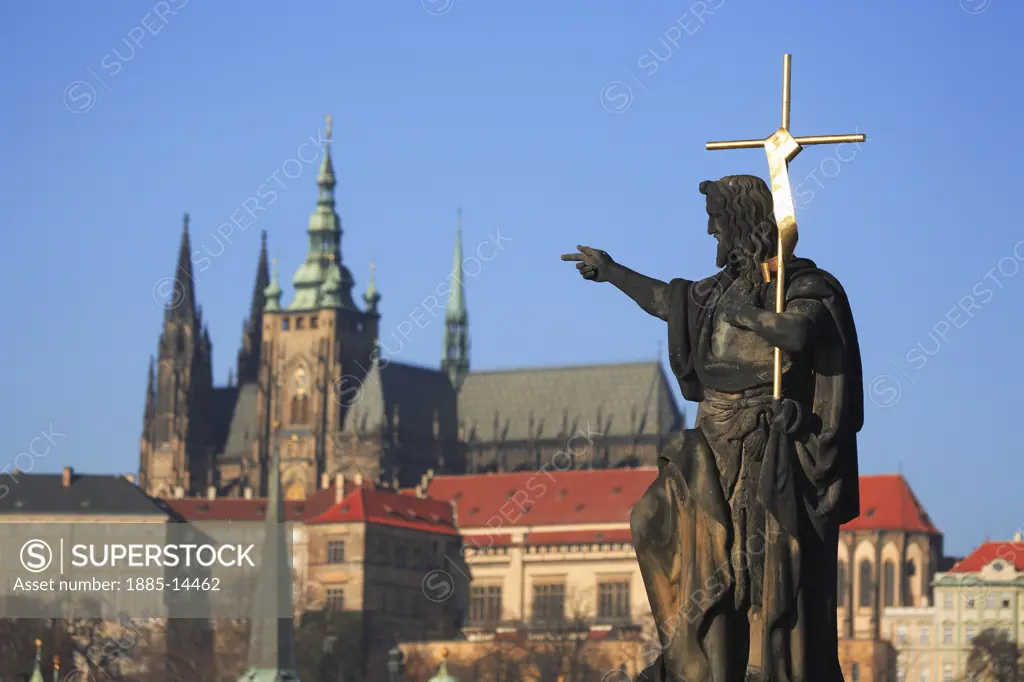 Czech. Republic, , Prague, Statue on Charles Bridge with Castle and Cathedral