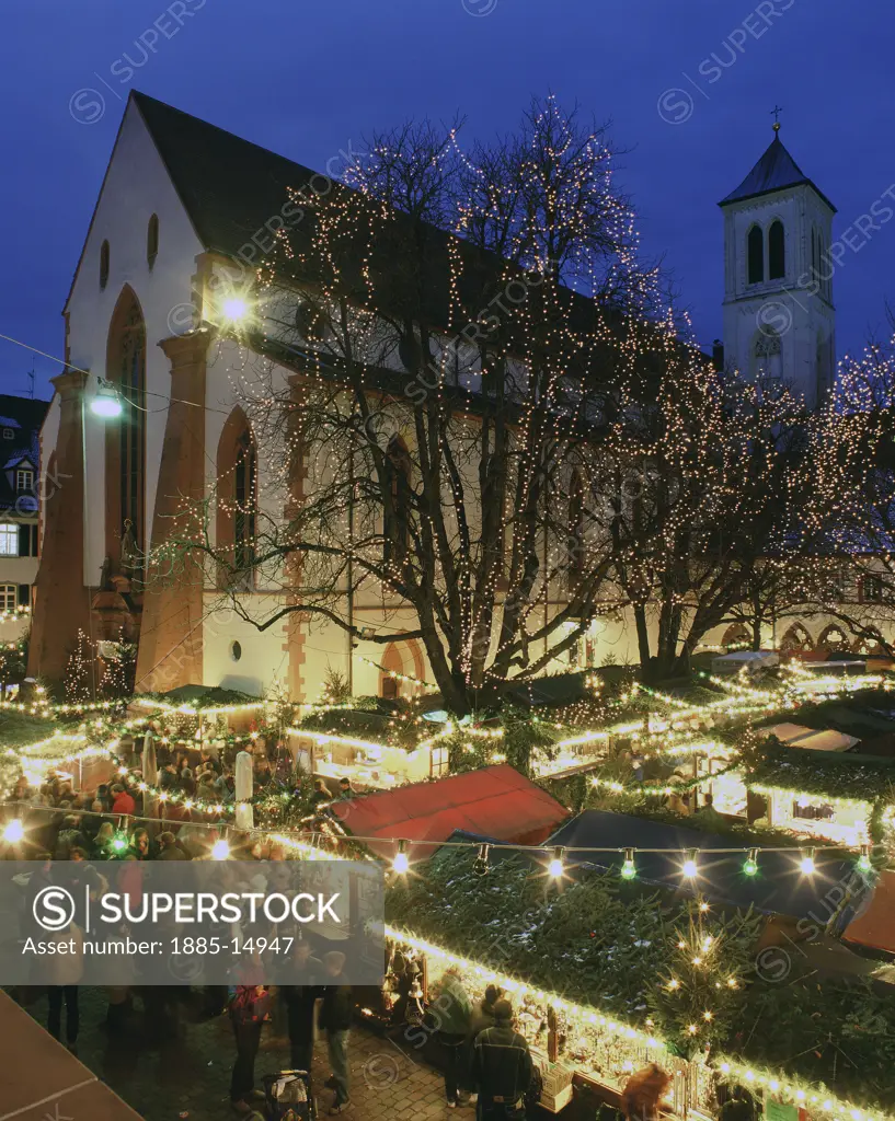 Germany, Baden Wurttemberg, Freiburg-im-Breisgau, View over Christmas market and church