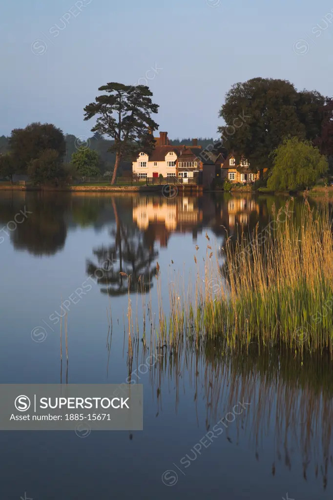 UK - England, Hampshire, Beaulieu, View across lake with reflections
