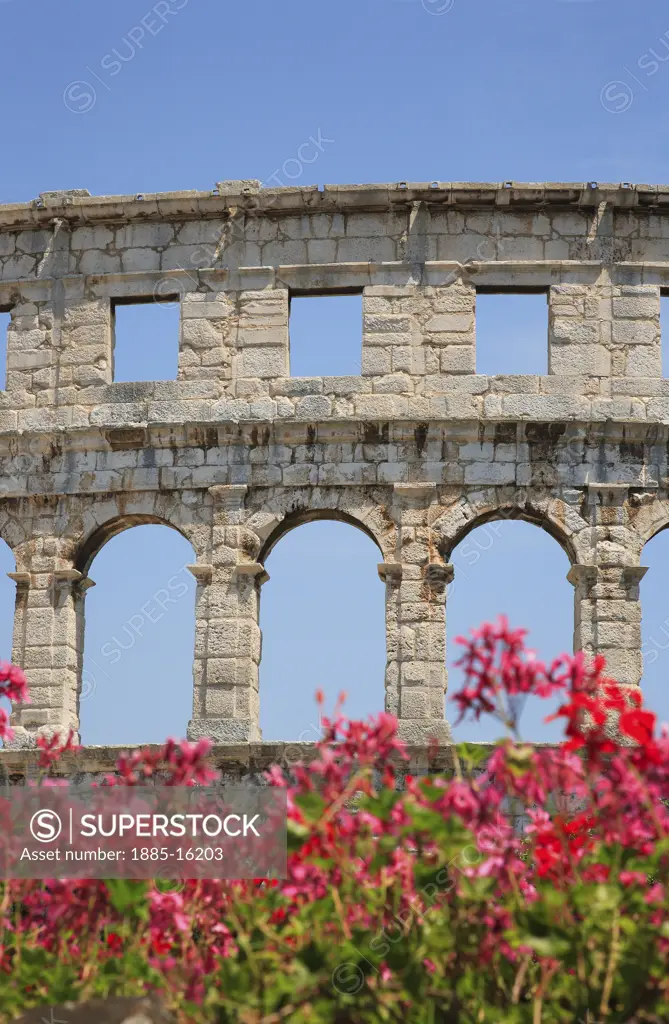 Croatia, Istria, Pula, Roman amphitheatre and flowers