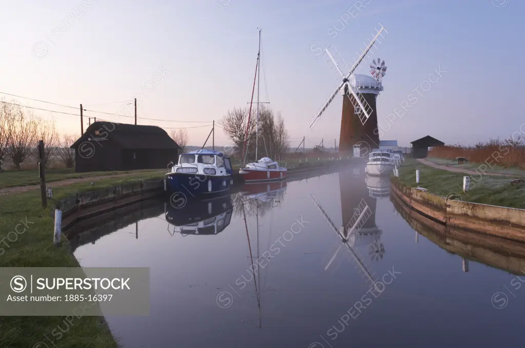 UK - England, Norfolk, Horsey, Horsey Mill and staithe at dawn