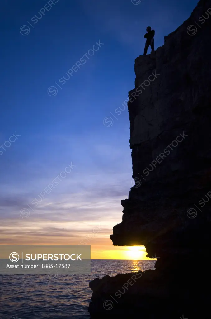 UK - England, Dorset, Portland Bill, Pulpit Rock at sunset
