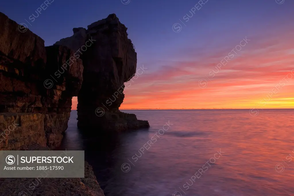 UK - England, Dorset, Portland Bill, Pulpit Rock at dusk