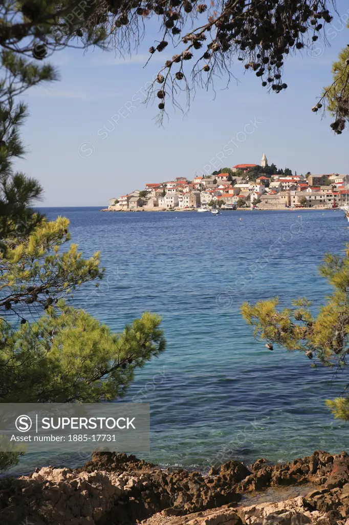 Croatia, Dalmatia, Primosten, Town through trees