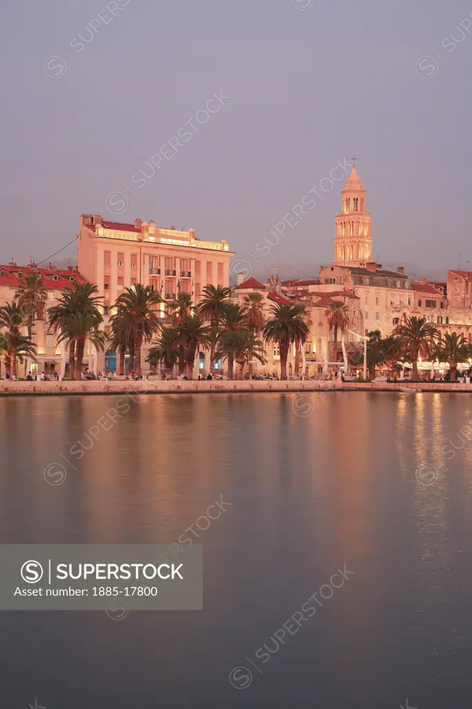 Croatia, Dalmatia, Split, Diocletians Palace - cathedral tower and harbour at dusk