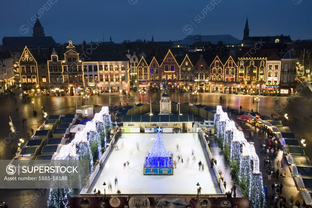 Belgium, Flanders, Bruges, View over the ice rink and Christmas Market 