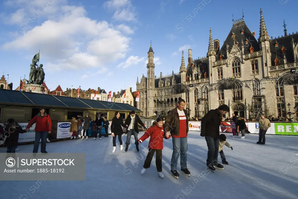 Belgium, Flanders, Bruges, Christmas ice rink in the Market Square