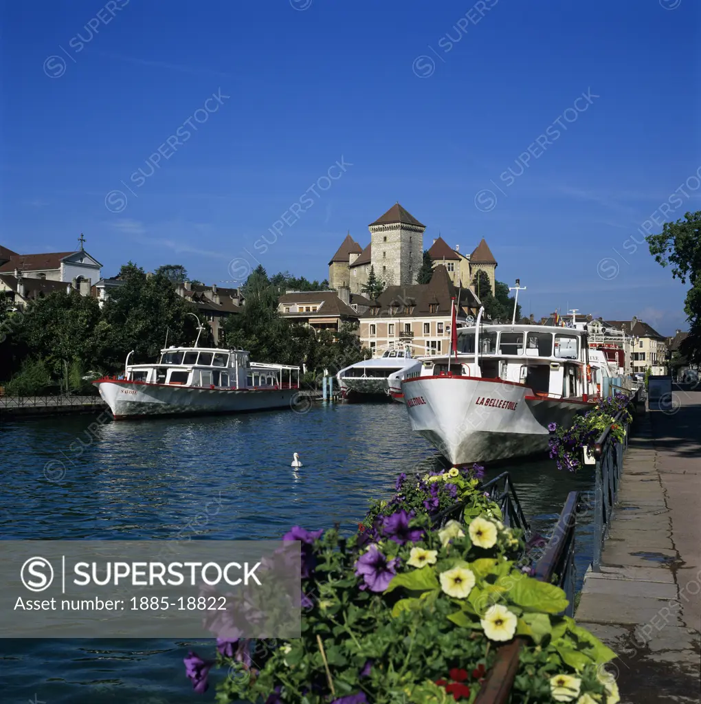 France, Rhone Alpes, Annecy, Cruise boats on Canal du Thiou below the Chateau