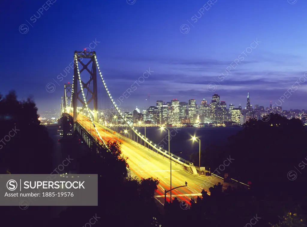 USA, California, San Francisco, Oakland Bay Bridge and city skyline at night
