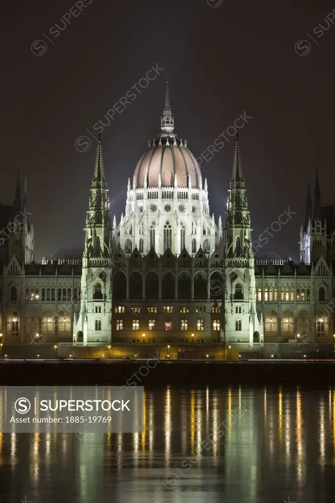 Hungary, , Budapest, Parliament building across River Danube at night