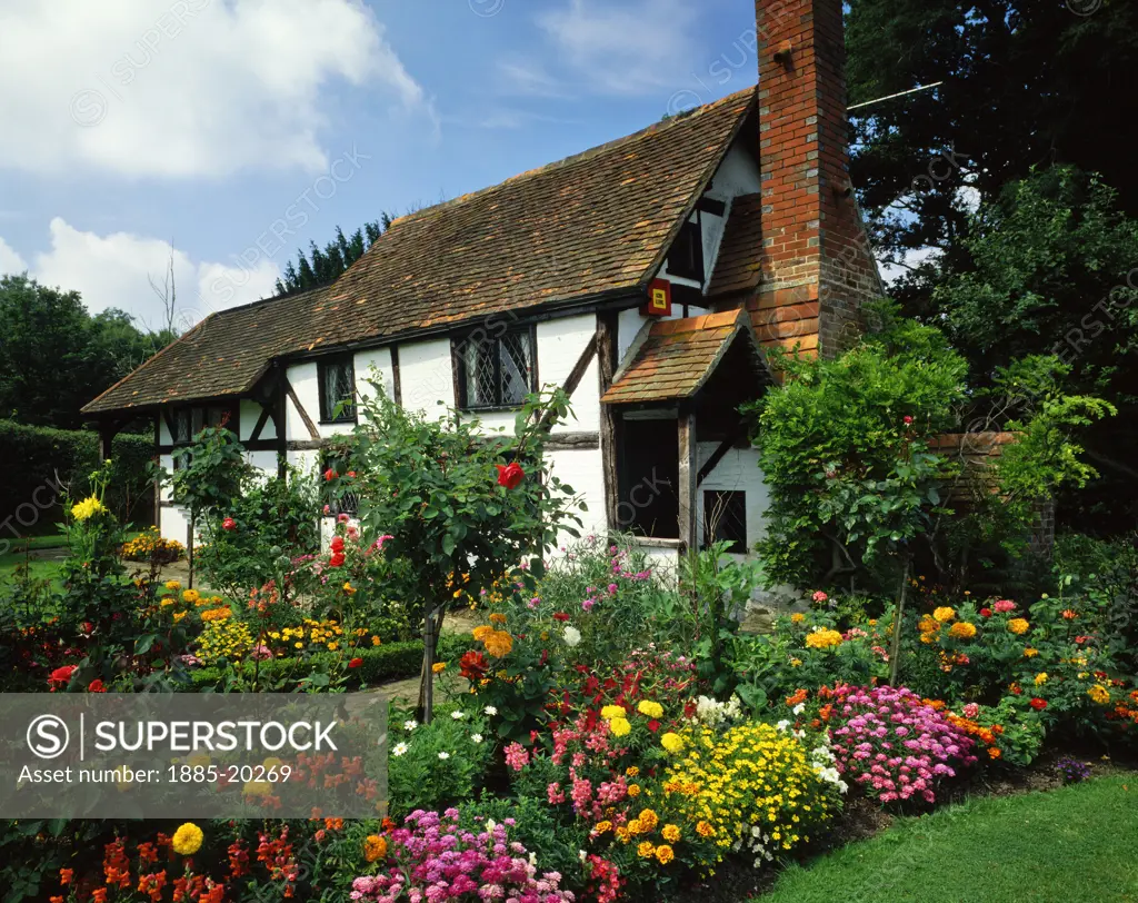 UK - England, Surrey, Ockley, Cottages - cottage and garden in summer