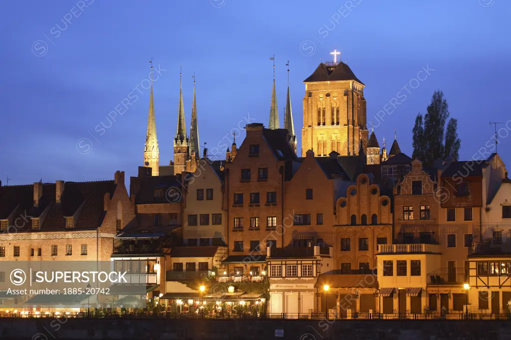 Poland, , Gdansk, City skyline and Church of St Mary at night