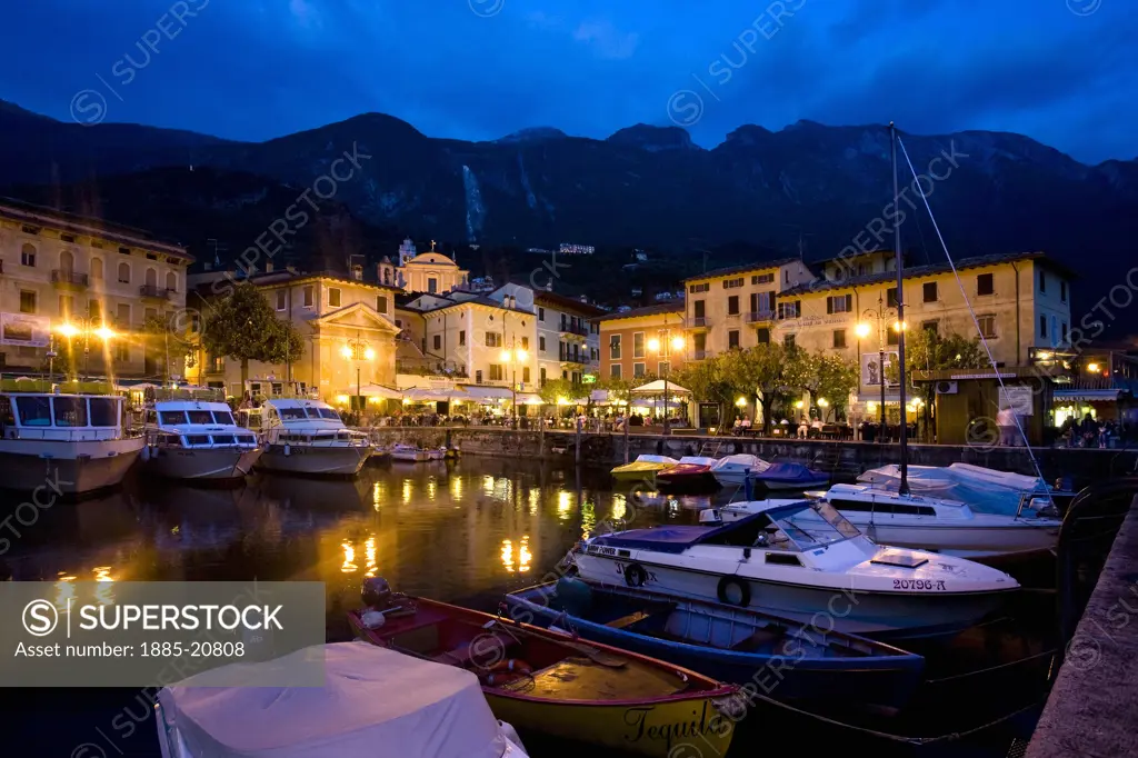 Italy, Lombardy - Lake Garda, Malcesine, Town and harbour at night