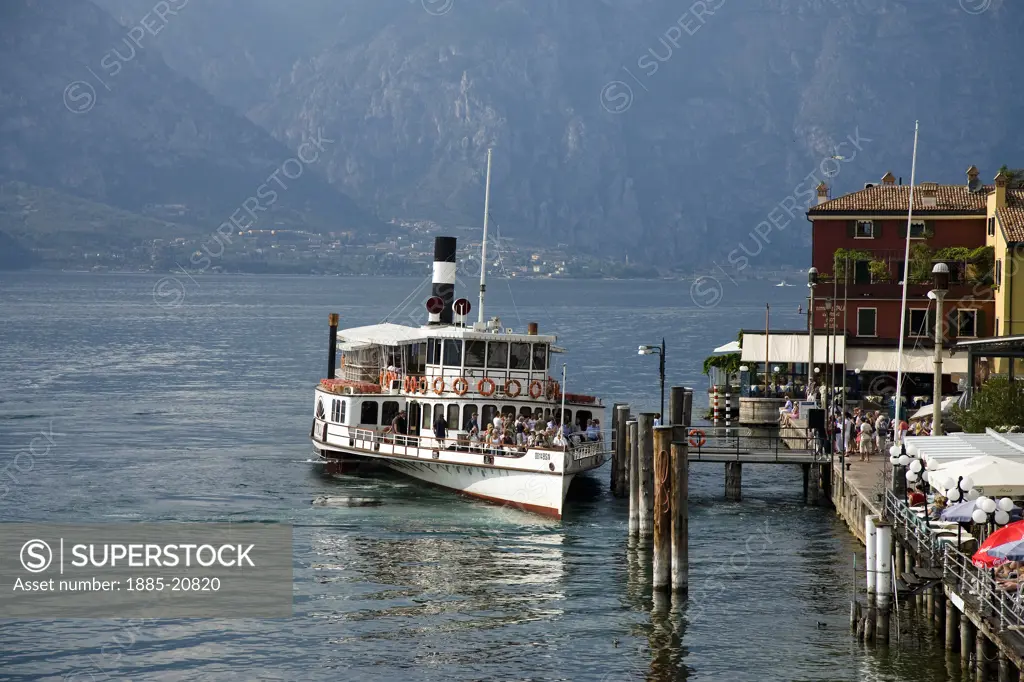Italy, Lombardy - Lake Garda, Malcesine, Paddle steamer on the lake