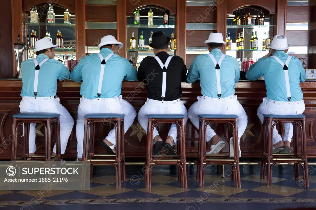 Caribbean, Jamaica, Ocho Rios, Local men at bar counter in hotel bar