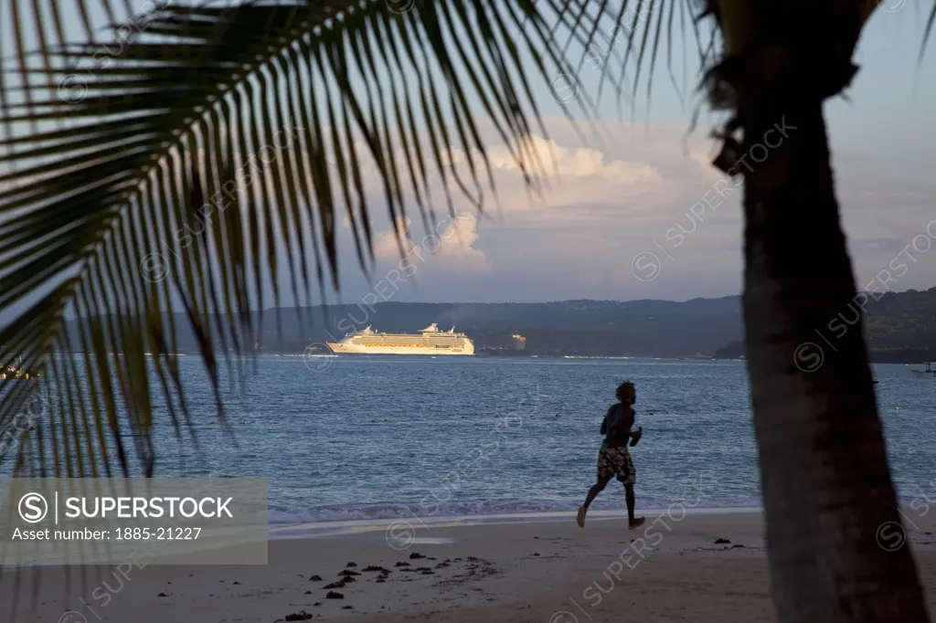 Caribbean, Jamaica, Ocho Rios, Cruise ship in bay at dusk