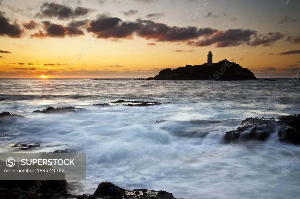 UK - England, Cornwall, St Ives, High Tide at Sunset, Godrevy Point and Lighthouse, St Ives Bay, North Cornwall