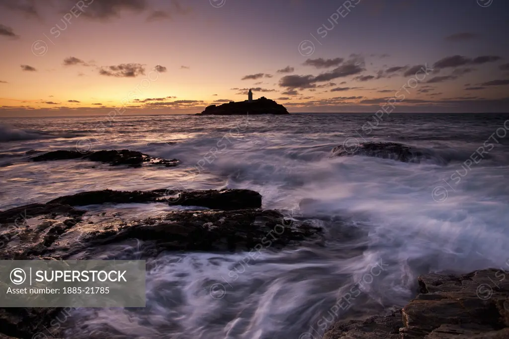 UK - England, Cornwall, St Ives, High Tide at Sunset, Godrevy Point and Lighthouse, St Ives Bay, North Cornwall