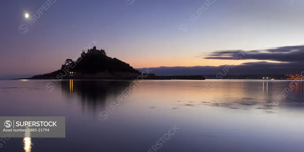 UK - England, Cornwall, Penzance, Rising Tide at dusk, St Michaels Mount, Marazion, Penzance, Cornwall