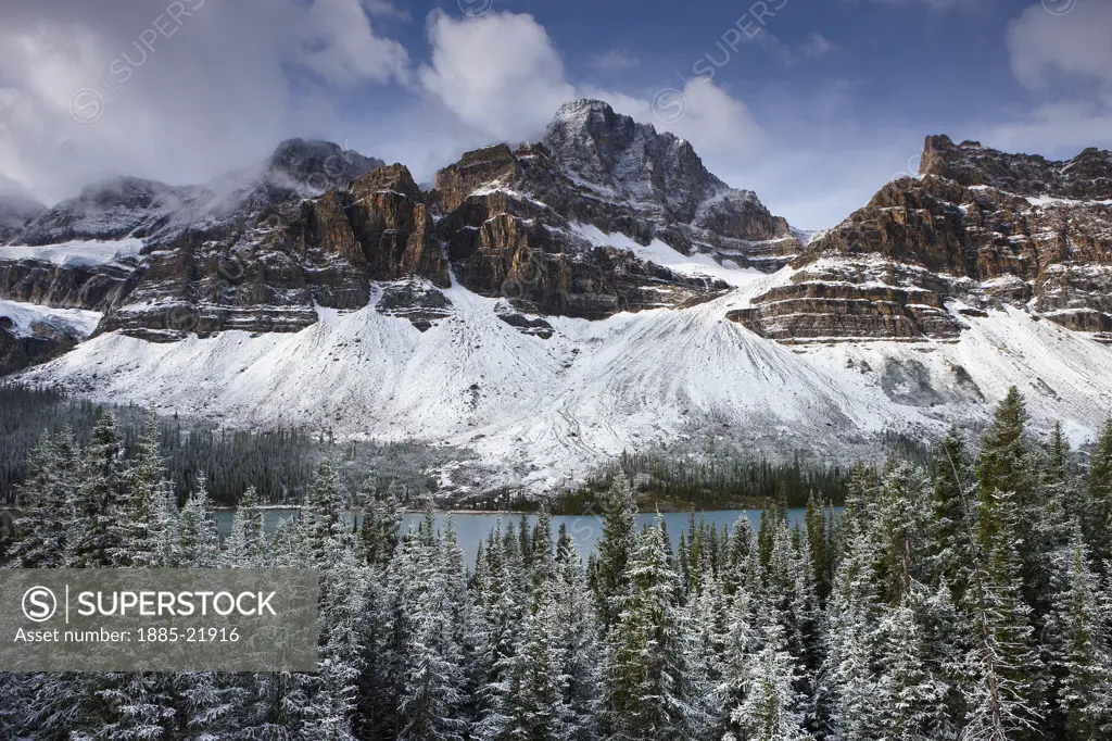 Canada, Alberta, Banff National Park, Mount Crowfoot & the Crowfoot Glacier above Bow Lake in the snow