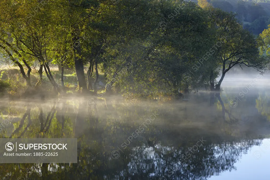 UK - England, Cumbria, Coniston, Morning mist on Coniston water