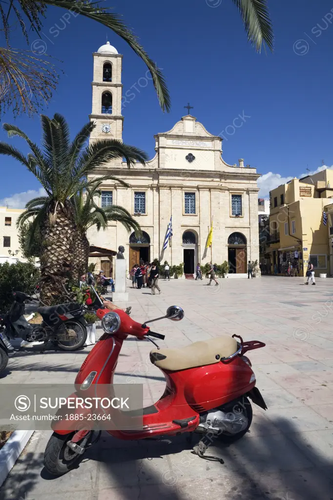 Greek Islands, Crete, Chania, Cathedral on Platia Mitropoleos and red moped