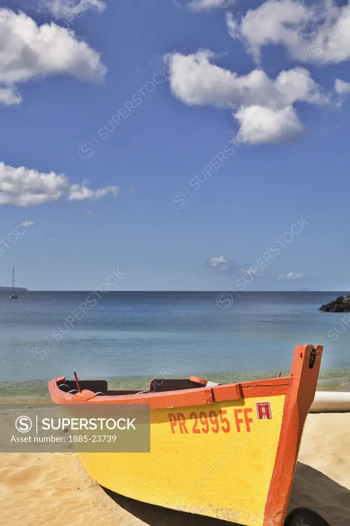 Caribbean, Puerto Rico, Aguadilla, Colourful boat on beach