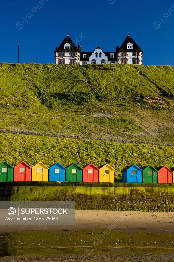 UK - England, Yorkshire, Whitby, Colourful beach huts on North Beach