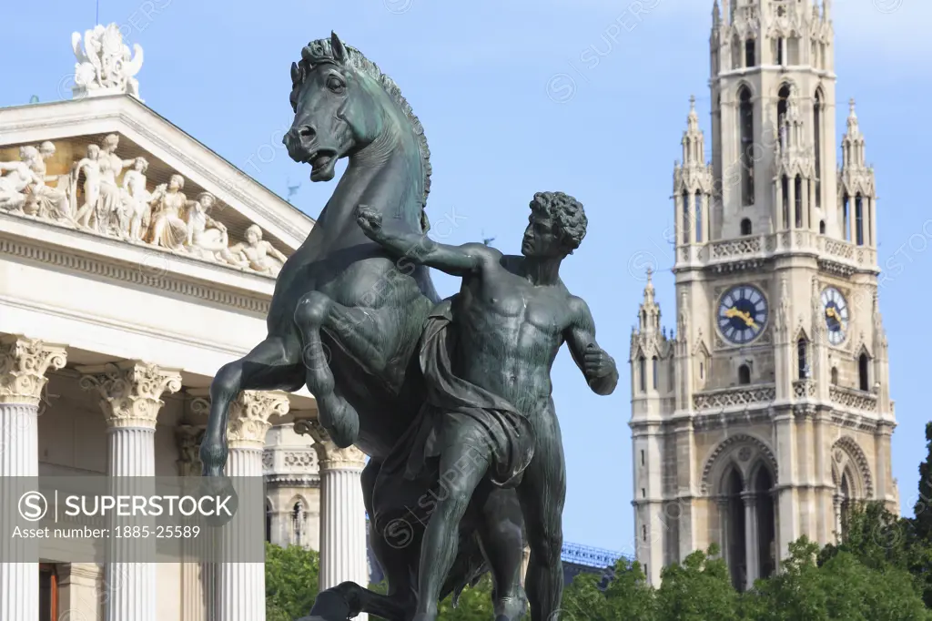 Austria, Vienna, Parliament  with statue and Rathaus - City Hall